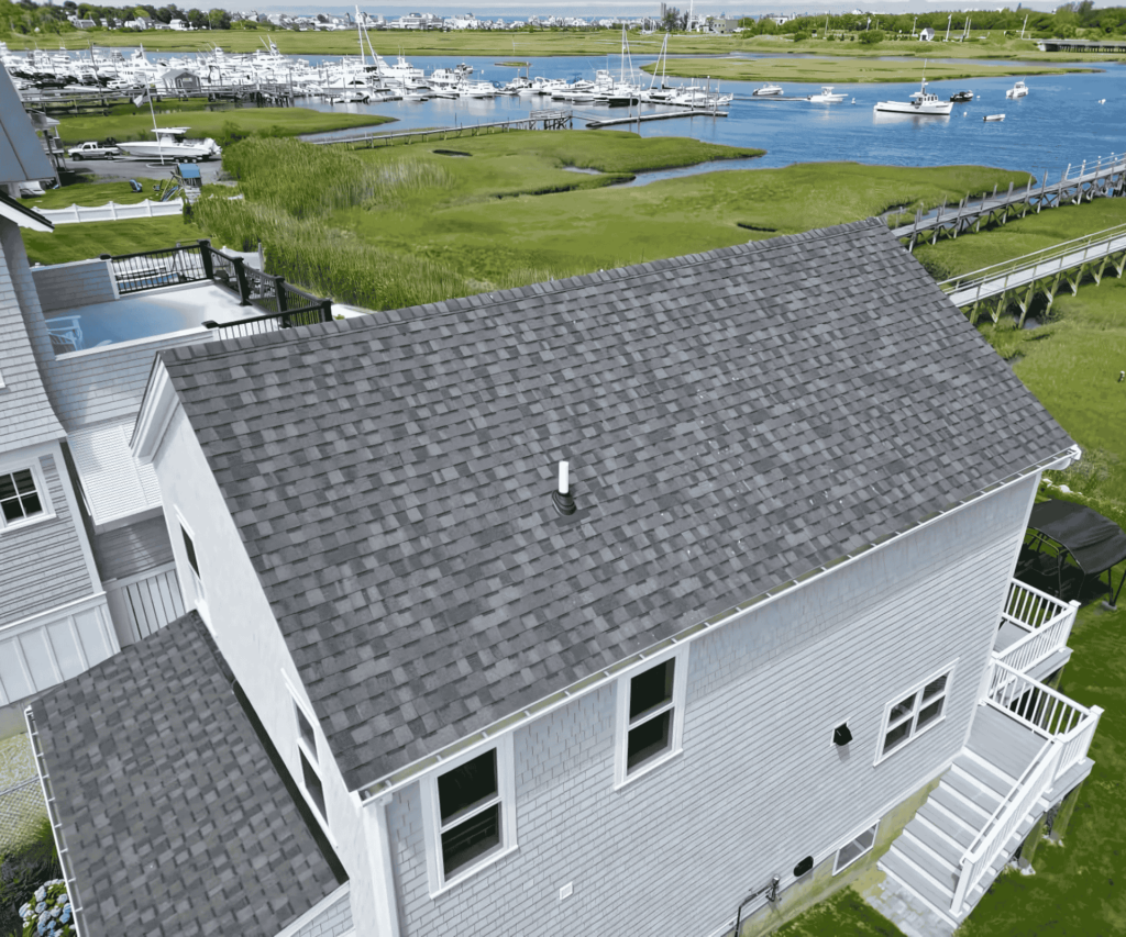 A beautiful coastal home with a sturdy, professionally installed roof by D&G Exteriors, serving Norfolk County.