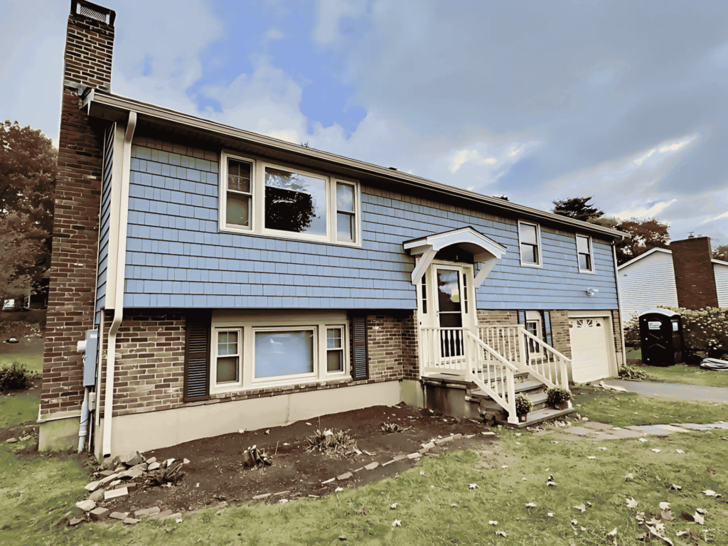 A house with new high-quality windows, improving natural light and energy savings in Marblehead, MA.