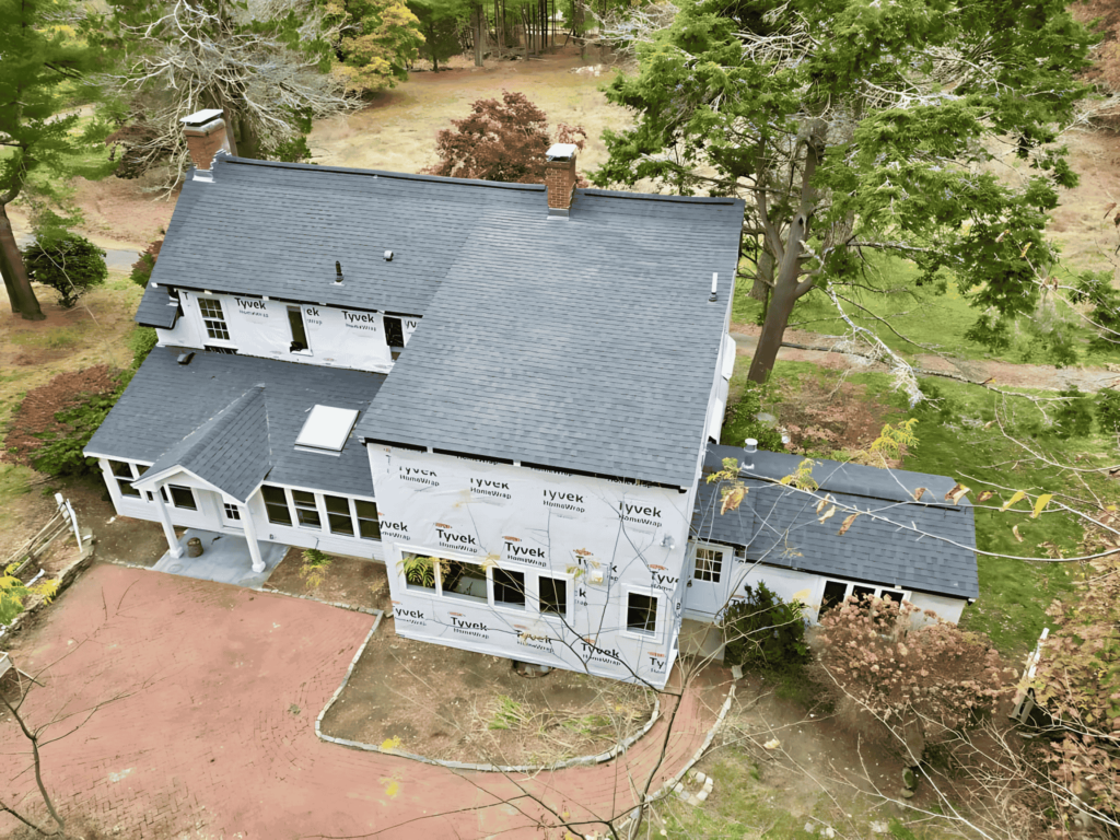 A high-quality roof replacement project in Medford, MA, featuring durable shingles installed by D&G Exteriors.