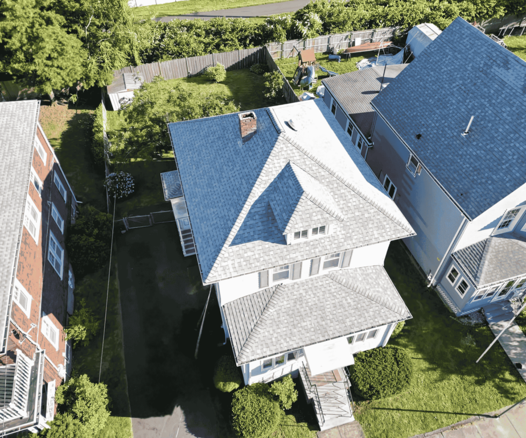 A newly installed roof on a residential home in Marblehead, MA, by D&G Exteriors.