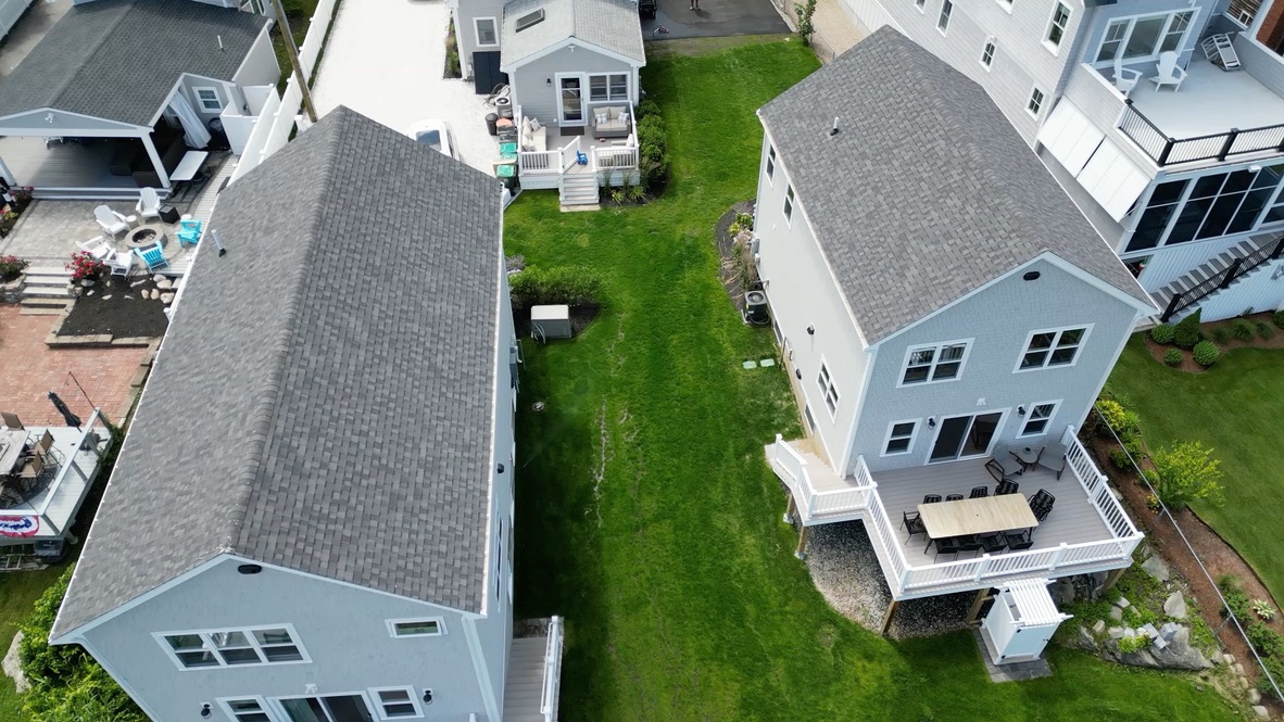 Roof repair in Boston, MA fixing shingles, leaks, and flashing
