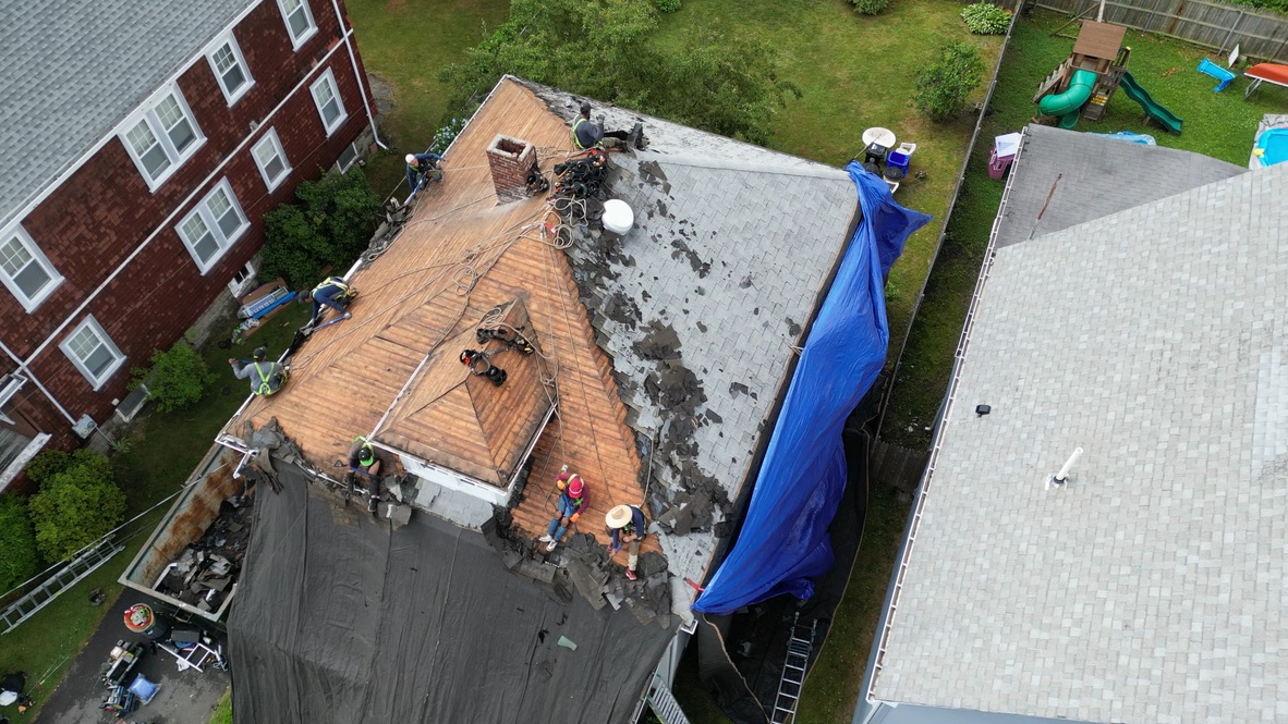 Roof repair services in Boston, MA restoring old and new roofs