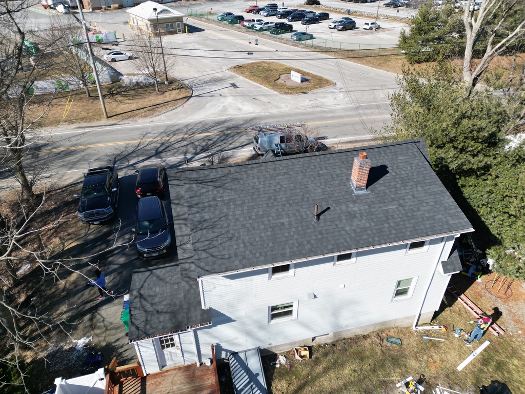 Roof replacement near me in Lexington, MA offering expert installation and warranty protection