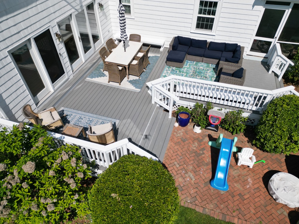Deck building services in Norwell, MA improving backyard living space