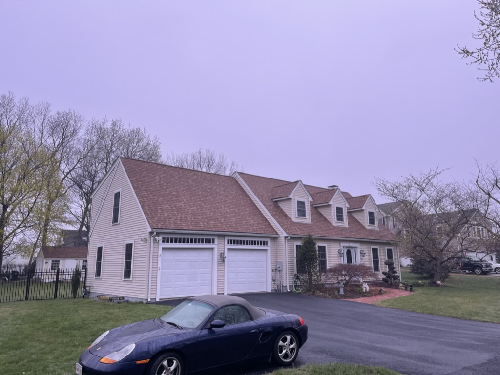 Roof repair in Wenham, MA restoring damaged roofing systems